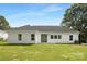 The home's backyard features a well-manicured lawn, providing a perfect outdoor space for entertainment and relaxation at 1312 W Monroe Rd, Salisbury, NC 28144