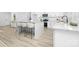 The kitchen boasts white cabinets, granite countertops, stainless steel appliances, and an island with bar seating at 1312 W Monroe Rd, Salisbury, NC 28144