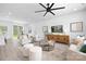 Bright and airy living room with modern furnishings, a ceiling fan, and an open floor plan perfect for entertaining at 1312 W Monroe Rd, Salisbury, NC 28144