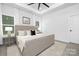 Elegant bedroom featuring a plush bed, neutral decor, and ample natural light for a tranquil retreat at 1312 W Monroe Rd, Salisbury, NC 28144