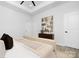 Cozy bedroom with a tray ceiling, ceiling fan, and calming neutral tones, providing a relaxing sanctuary at 1312 W Monroe Rd, Salisbury, NC 28144