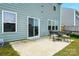 Cozy patio with outdoor dining set, perfect for entertaining and relaxation at 133 Aspire Cir, Wingate, NC 28174