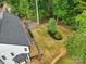An aerial view of the home and backyard, showing the deck, landscaping, and privacy at 136 Digh Cir # 4, Mooresville, NC 28117