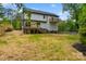 Two-story home featuring a wooden deck and a private balcony overlooking the spacious backyard at 136 Digh Cir # 4, Mooresville, NC 28117