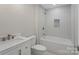 Well lit bathroom featuring a shower and tub combination with tiled surround and modern hardware at 136 Digh Cir # 4, Mooresville, NC 28117