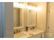 Bathroom featuring double sink vanity with modern fixtures and elegant countertop at 136 Digh Cir # 4, Mooresville, NC 28117
