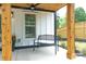 Close up of the porch showing the timber columns, ceiling fan and bench at 136 Digh Cir # 4, Mooresville, NC 28117