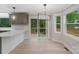 Bright eat in kitchen featuring access to the deck, and light wood flooring at 136 Digh Cir # 4, Mooresville, NC 28117