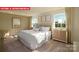 Comfortable bedroom is complete with plush carpeting and soft, natural light at 1373 Zermatt Ct, Monroe, NC 28112
