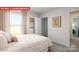Airy bedroom featuring a decorative comforter, stylish curtains, and sun-filled window at 1373 Zermatt Ct, Monroe, NC 28112