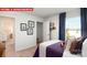 Bright bedroom featuring unique decor, football accents, and a comfortable bed at 1373 Zermatt Ct, Monroe, NC 28112
