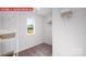 Well-organized closet featuring shelving and ample storage space at 1373 Zermatt Ct, Monroe, NC 28112