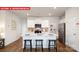 Modern kitchen featuring a center island, white cabinets, stainless steel appliances, and sleek countertops at 1373 Zermatt Ct, Monroe, NC 28112