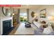 Inviting living room boasts a cozy fireplace and sliding glass doors to the outdoor area at 1373 Zermatt Ct, Monroe, NC 28112