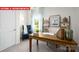 Charming home office with large desk and stylish decor at 1373 Zermatt Ct, Monroe, NC 28112