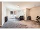 Spacious bedroom with neutral walls and carpeting, a double window and multiple shelving units at 13820 Cypress Woods Dr, Huntersville, NC 28078