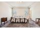 Cozy bedroom with carpet, tray ceiling and natural light at 13820 Cypress Woods Dr, Huntersville, NC 28078