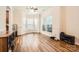 Bright living space with wood floors and large windows at 13820 Cypress Woods Dr, Huntersville, NC 28078