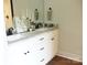Bathroom featuring dual sinks with granite countertops and modern fixtures at 1802 Cooper Ave, Kannapolis, NC 28081
