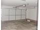 Spacious garage featuring a modern door and ample room for parking and storage at 1802 Cooper Ave, Kannapolis, NC 28081