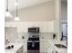 Modern kitchen with white cabinets, stainless steel appliances and marble countertops at 1802 Cooper Ave, Kannapolis, NC 28081
