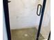 Modern shower with glass door, sleek black fixtures, and stylish tile at 1802 Cooper Ave, Kannapolis, NC 28081