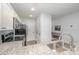 Stylish kitchen with granite countertops, stainless appliances and bright lighting at 18741 Nautical Dr # 205, Cornelius, NC 28031