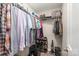 Walk-in closet featuring hanging racks and shelves for storage at 18741 Nautical Dr # 205, Cornelius, NC 28031
