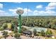 Overhead shot of the water tower, tennis courts, and surrounding trees in Tega Cay, SC at 2004 Marquesas Ave, Tega Cay, SC 29708