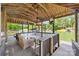 Relaxing covered boat dock with outdoor seating, perfect for enjoying waterfront views and activities at 2004 Marquesas Ave, Tega Cay, SC 29708