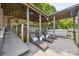 Covered boat dock with lounge chairs, offering a relaxing space to enjoy the lake and waterfront activities at 2004 Marquesas Ave, Tega Cay, SC 29708