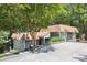 Two-story home featuring a sloped driveway, partial shade trees, and well-kept landscaping at 2004 Marquesas Ave, Tega Cay, SC 29708
