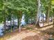 Scenic lake view with steps and lakeside amenities, showcasing the property's access to waterfront living at 2004 Marquesas Ave, Tega Cay, SC 29708