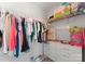 Organized closet with hanging rods, shelves, and drawers, providing practical storage solutions for a well-kept wardrobe at 204 Fesperman Cir, Troutman, NC 28166