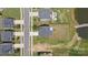 The aerial view shows houses with pools, well-maintained lawns, and proximity to a pond at 207 Welcombe St, Mooresville, NC 28115