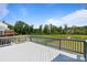 Outdoor deck featuring a view of the yard and pond at 207 Welcombe St, Mooresville, NC 28115