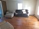 Bright living room with hardwood floors and comfortable seating at 209 14Th Se Ave, Hickory, NC 28602