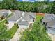 Aerial view of the residential community showing the home's landscaping and proximity to nearby homes at 21214 W Tern Ct, Fort Mill, SC 29707