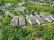 Aerial shot of community homes surrounded by mature trees on a sunny day at 21214 W Tern Ct, Fort Mill, SC 29707