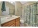Full bathroom with oak vanity and tile floor at 21214 W Tern Ct, Fort Mill, SC 29707