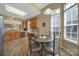 Cozy breakfast nook with a round table, breakfast nook and view into the kitchen area at 21214 W Tern Ct, Fort Mill, SC 29707