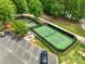 Aerial image showcases well-maintained pickleball courts with surrounding trees in a community at 23117 Whimbrel Cir, Fort Mill, SC 29707
