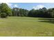 Expansive backyard with lush green grass at 2742 Flat Creek Rd, Lancaster, SC 29720