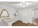 Kitchen featuring white cabinetry, tile flooring and a breakfast nook at 2742 Flat Creek Rd, Lancaster, SC 29720
