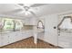 A kitchen featuring white cabinetry and a breakfast nook at 2742 Flat Creek Rd, Lancaster, SC 29720