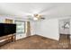 Neutral living room with natural lighting, and a view of a doorway to another room at 2742 Flat Creek Rd, Lancaster, SC 29720