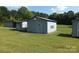 Lawn view of various outbuildings for storage at 2742 Flat Creek Rd, Lancaster, SC 29720