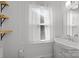 Bright bathroom featuring a modern vanity with a sleek white sink and lots of natural light at 309 Ackert Ave, Salisbury, NC 28144