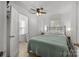 Comfortable bedroom featuring a queen bed, a ceiling fan and a closet at 309 Ackert Ave, Salisbury, NC 28144