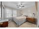 Cozy bedroom featuring a full bed, neutral walls, and plenty of natural light from the windows at 309 Ackert Ave, Salisbury, NC 28144